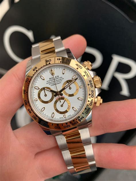 rolex daytona yellow gomd syltainless steel white face|Rolex daytona gold edition.